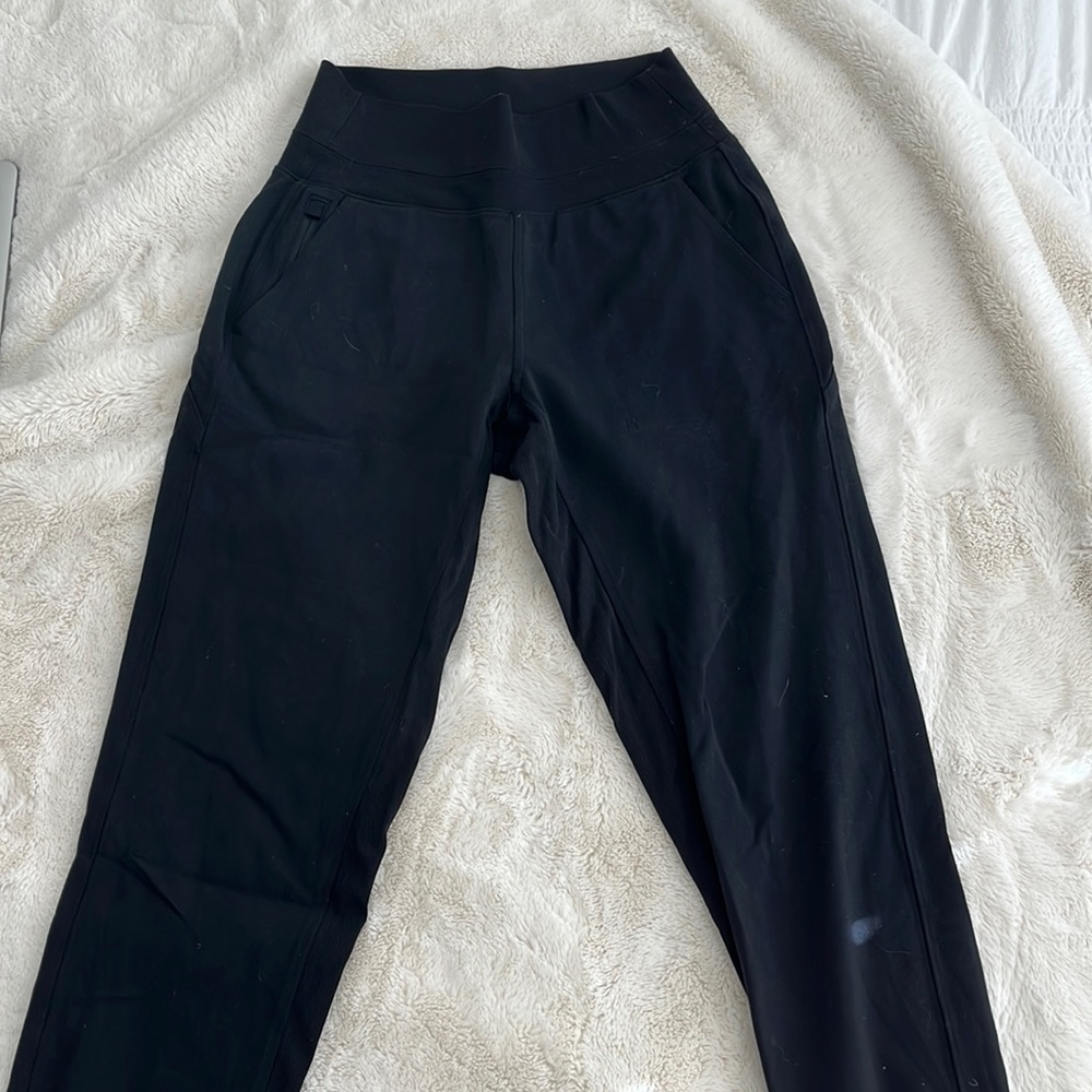 Black Athleta salutation joggers